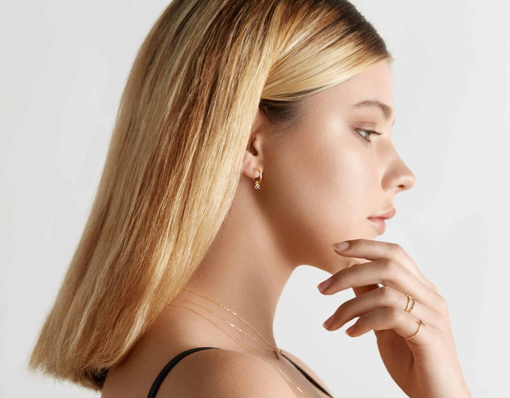 Aros oro 10mm garra topacios M