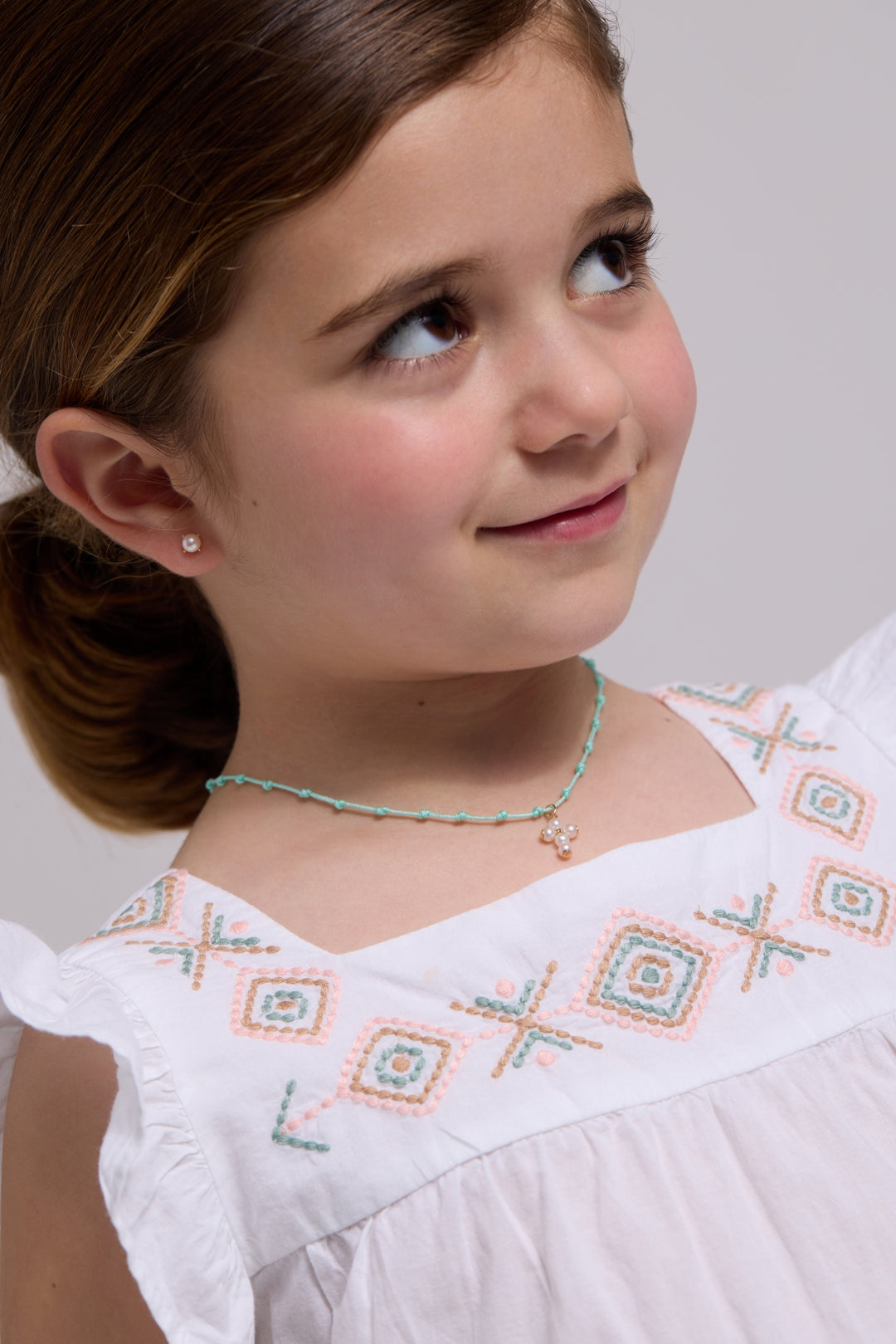 Collar oro mil nudos macramé cruz perlas