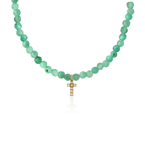 Gold necklace with emeralds and diamond cross
