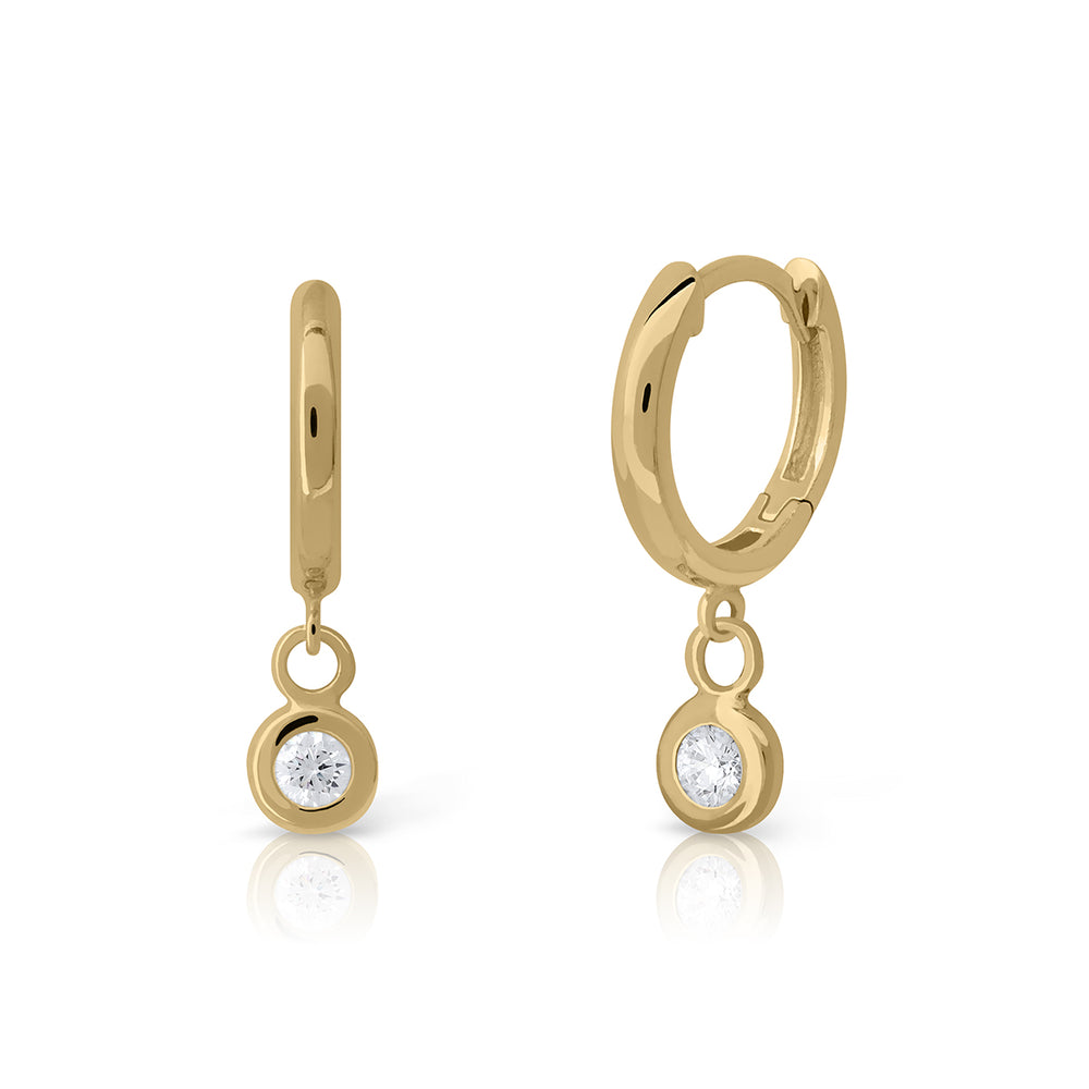 Gold stud earrings with diamond setting