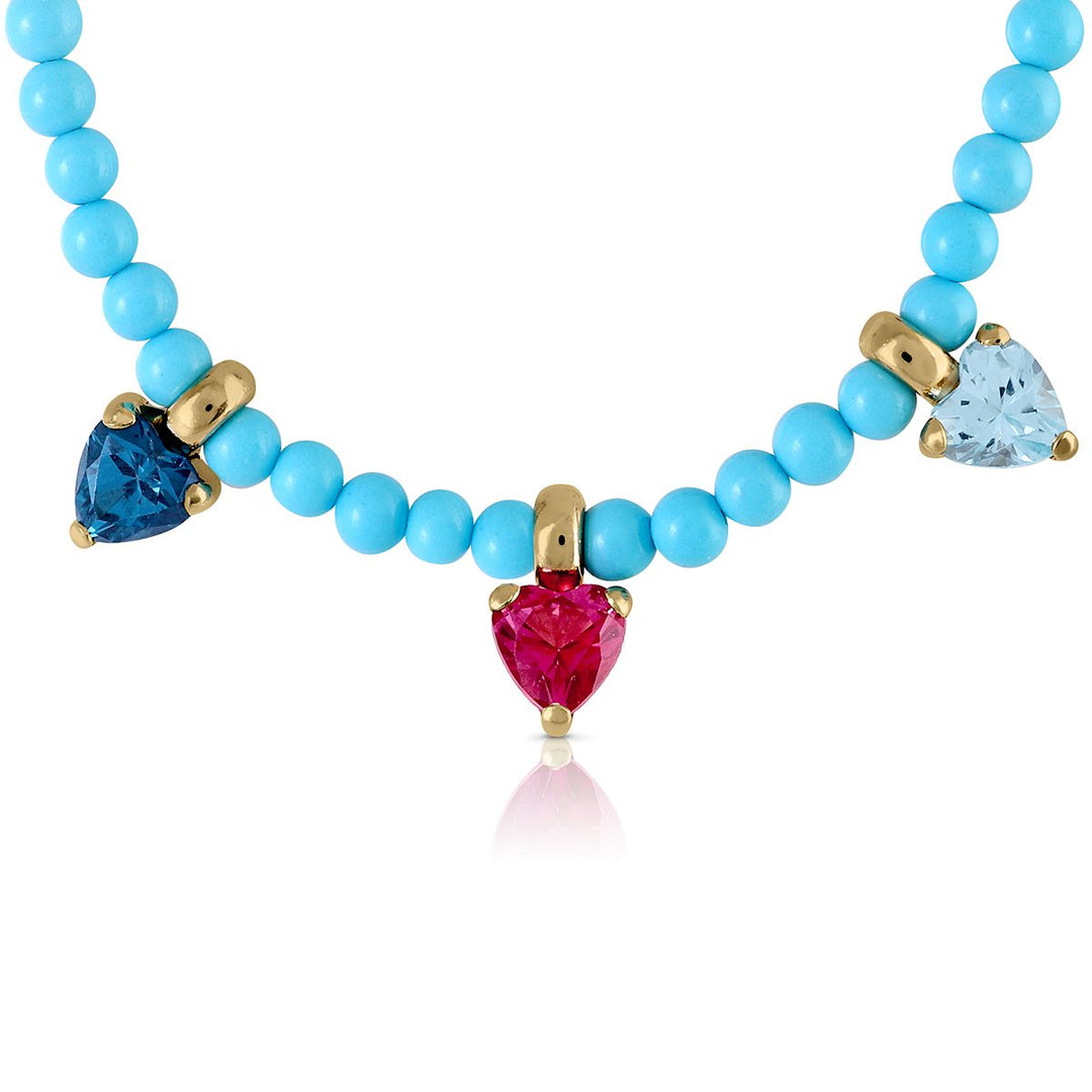 Collar oro Turquesas 3 corazones topacios