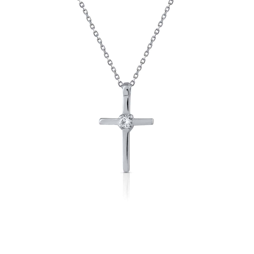 cruz blanca con diamante